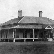 Boys standing on the verandah of the Queensland Home for Boys, Riverview